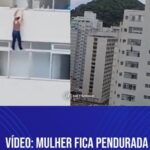 mulher fica pendurada predio enquanto limpava